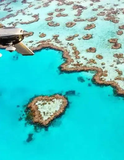 Heart-Reef-Whitsundays Heart Reef Whitsundays with plane